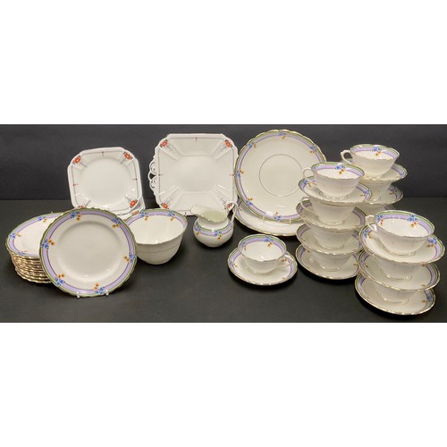 67 - An Art Deco Shelley dessert service for six, comprising cake plate and dessert plates; an Art Deco T... 