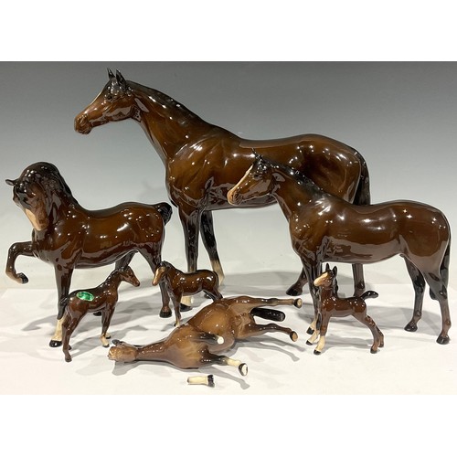 70 - A Beswick model of a Hunter Race Horse, glazed in gloss brown, 29cm high, printed mark; two Beswick ... 