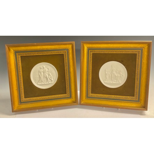 76 - A pair of Royal Copenhagen classical circular plaques, 32.5cm x 32.5cm