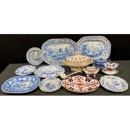 144 - A 19th century blue and white meat plate, Bridge of Lucano Italy pattern, with gravy well, 49cm wide... 