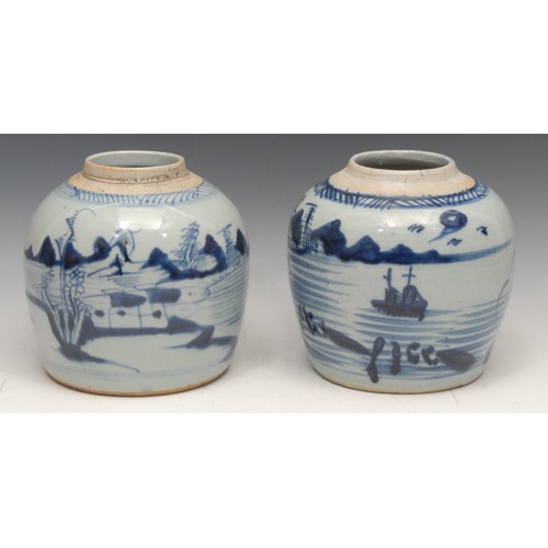 216 - A Chinese ovoid ginger jar, painted in tones of underglaze blue with a landscape, 17cm high; another... 