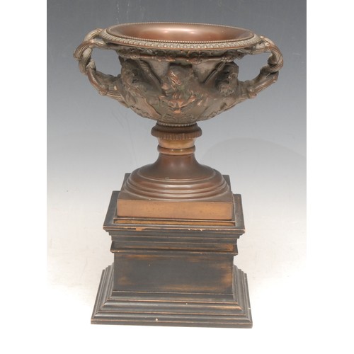 376 - A late 19th century brown patinated bronze mantel urn, cast in the Grand Tour taste after the Warwic... 