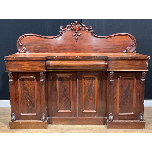 110 - A Victorian mahogany inverted break-centre sideboard or serving table, 147cm high, 183cm wide, 56cm ... 