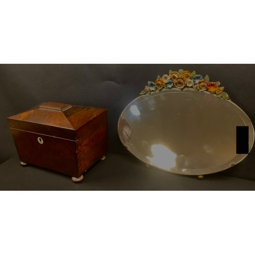 417 - A George III mahogany sarcophagus shaped tea caddy, mother-of-pearl escutcheon, pair of interior cov... 