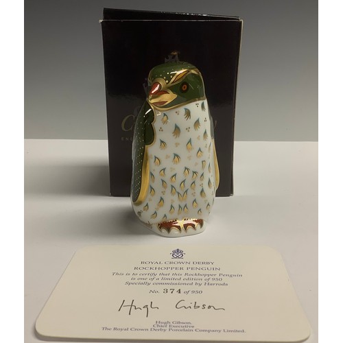 20 - A Royal Crown Derby paperweight, Harrods Rockhopper Penguin, in a distinctive Harrods green colourwa... 