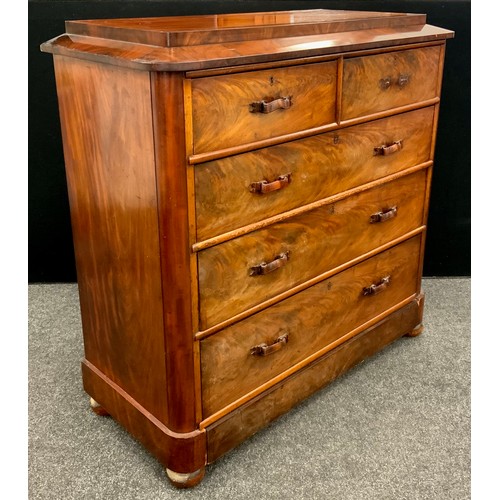 110A - An early Victorian mahogany chest, sarcophagus top above two short and three long graduated drawers,... 