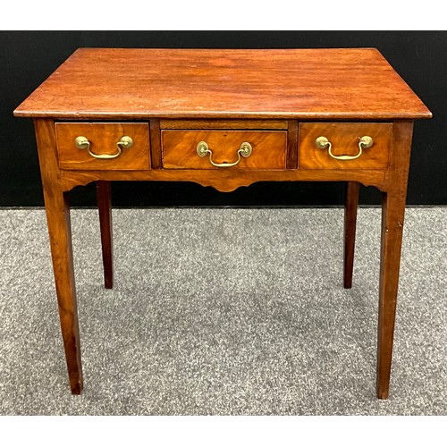 447 - A George III mahogany side table, oversailing rectangular top, above three frieze drawers, tapered s... 