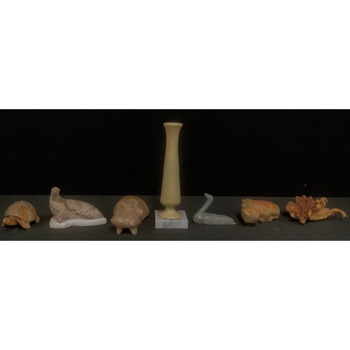 505 - A carved soapstone basking hippo, 17cm long; another, 14cm long; a carved soapstone tortoise; simila... 