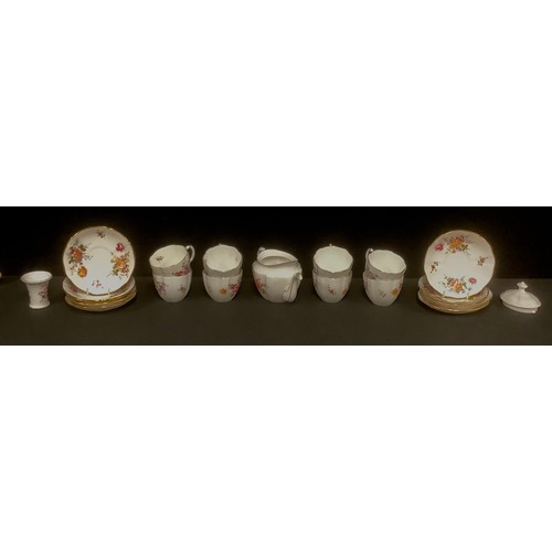 512 - A Royal Crown Derby Posies pattern tea set, comprising tea pot, eight cups, nine saucers