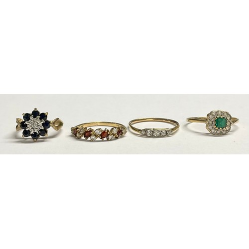 605 - A 9ct gold dress ring, set with green and clear stones, size L, marked 375, 1.4g; an unmarked five s... 