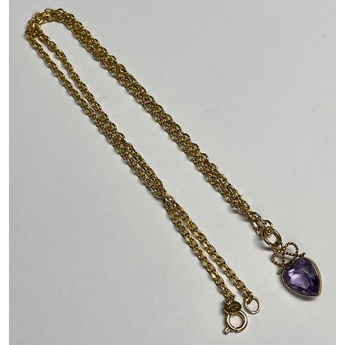 610 - A 9ct gold necklace with 9ct gold mounted amethyst pendant, 7.8g