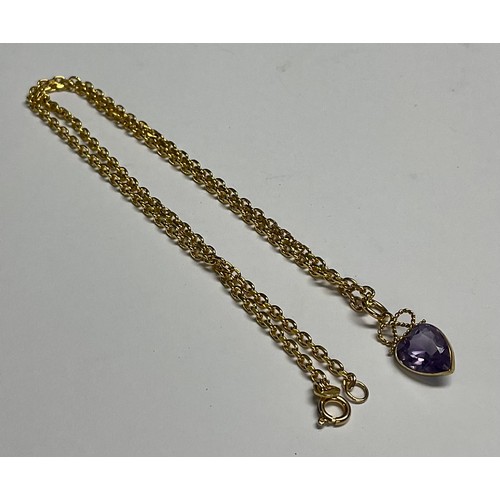 610 - A 9ct gold necklace with 9ct gold mounted amethyst pendant, 7.8g