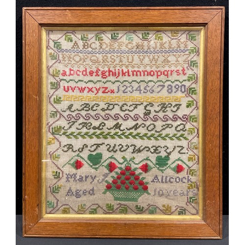 581 - A Victorian woolwork sampler, Mary Allcock, Aged 10 Years