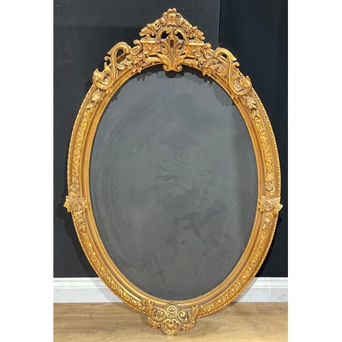 670 - Interior Design - a Rococo style oval giltwood frame converted in to a chalk board, 125cm x 90cm