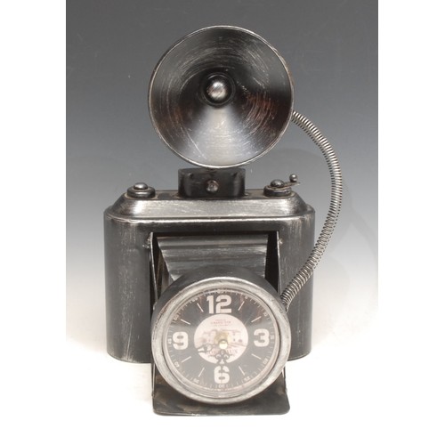 694 - A 20th century French tin mantel clock, modelled as a folding camera, black dial, 31cm high