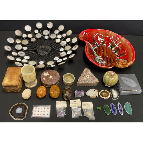 728 - A small amethyst geode section; other semi-precious specimen stones; an onyx apple; an alabaster egg... 