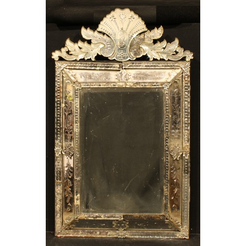 1896 - An early 20th century Venetian looking glass, bevelled octagonal mirror plate, 132cm high, 81cm wide