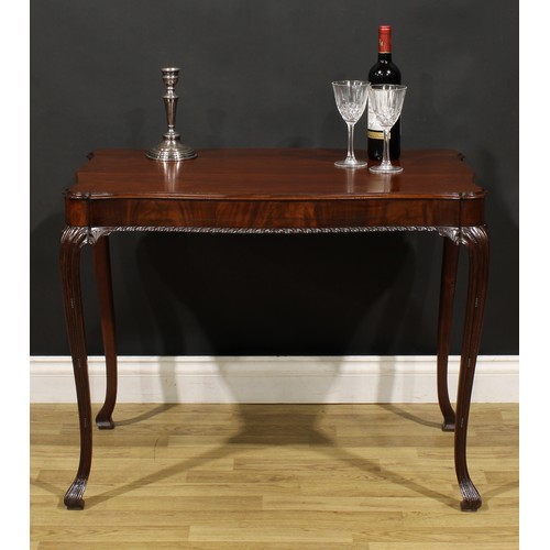 1237 - A George II Revival Irish mahogany silver table, serpentine rectangular top with moulded edge, cabri... 