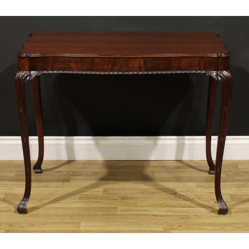 1237 - A George II Revival Irish mahogany silver table, serpentine rectangular top with moulded edge, cabri... 