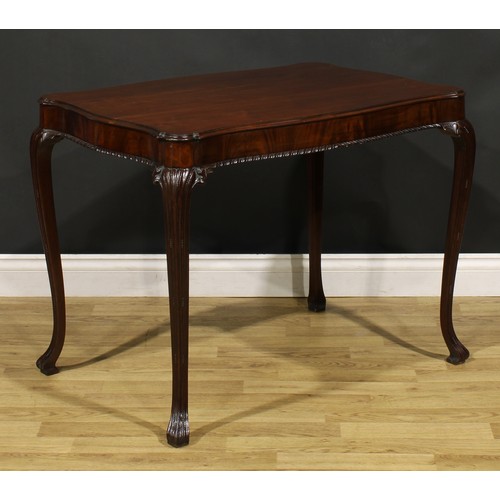 1237 - A George II Revival Irish mahogany silver table, serpentine rectangular top with moulded edge, cabri... 