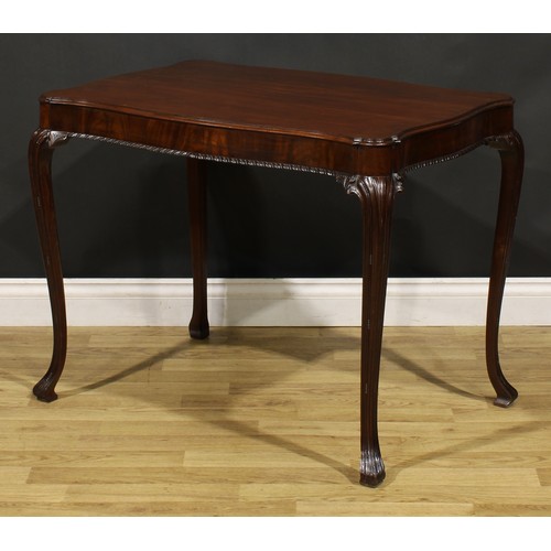 1237 - A George II Revival Irish mahogany silver table, serpentine rectangular top with moulded edge, cabri... 