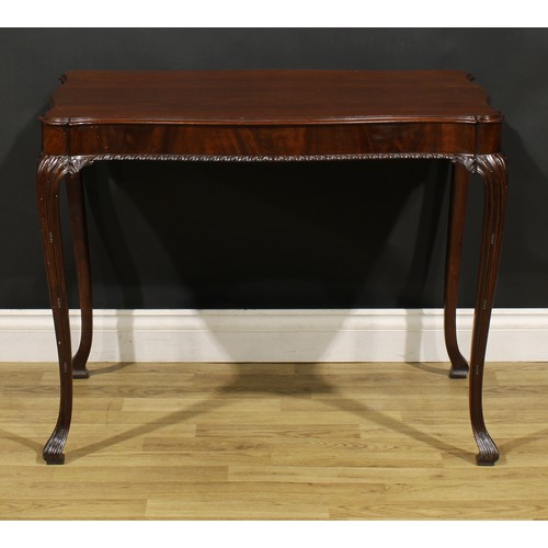 1237 - A George II Revival Irish mahogany silver table, serpentine rectangular top with moulded edge, cabri... 