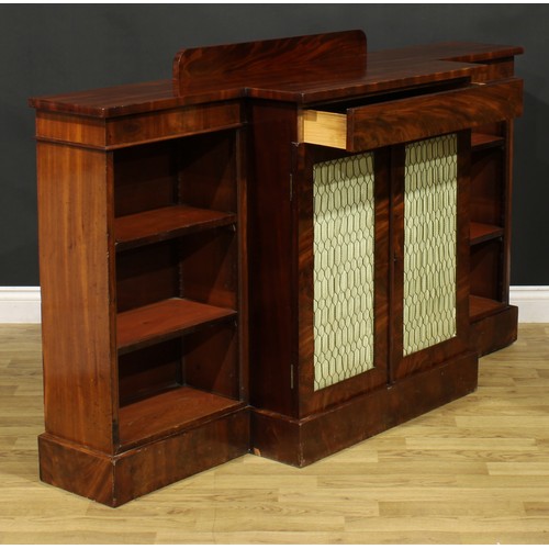 1343 - A Post-Regency mahogany break-centre low library bookcase, by J. Russell, upholsterer, cabinet maker... 