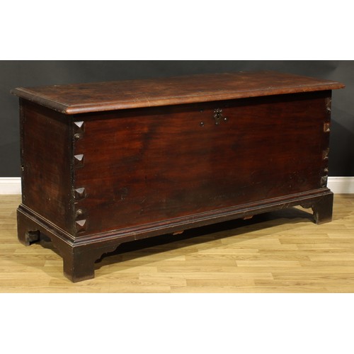 1350 - A substantial 18th century cherry blanket chest, hinged top, skirted base, bracket feet, 87cm high, ... 