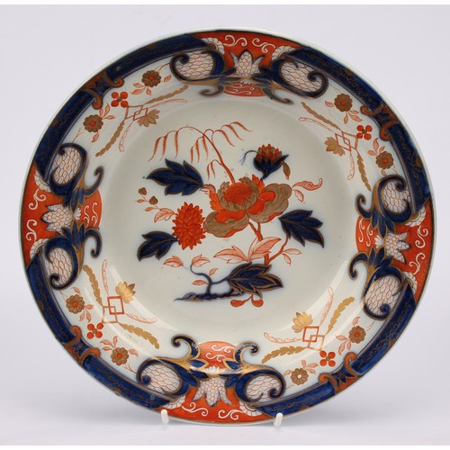 37 - A pair of early 19th century Swansea Imari soup dishes, decorated in the typical palette, 24cm diame... 