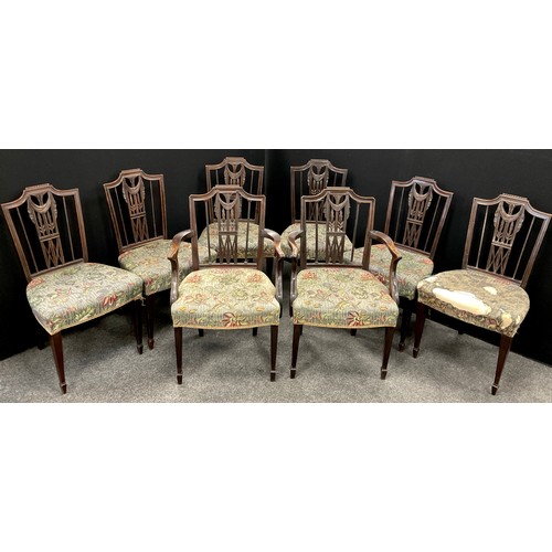 1346 - A set of eight Sheraton design mahogany dining chairs, comprising six side chairs and a pair of carv... 