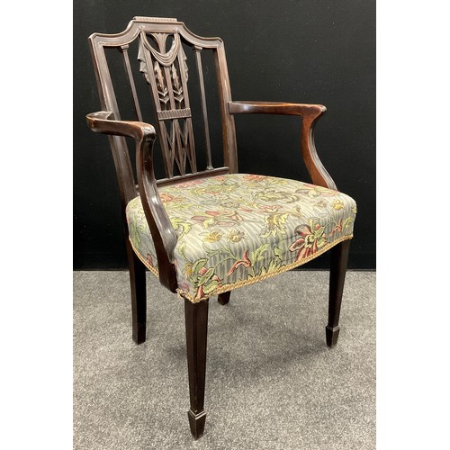 1346 - A set of eight Sheraton design mahogany dining chairs, comprising six side chairs and a pair of carv... 