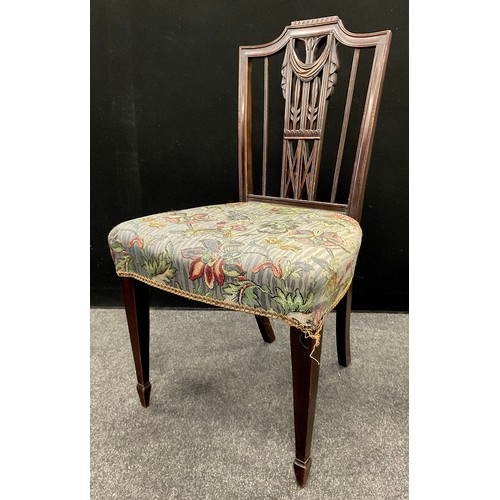 1346 - A set of eight Sheraton design mahogany dining chairs, comprising six side chairs and a pair of carv... 