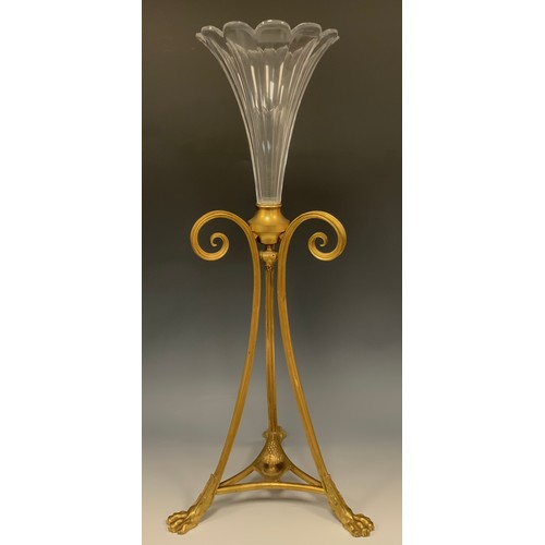 1914 - An early 20th century gilt metal table centre epergne, facetted trumpet shaped flute, triform base w... 