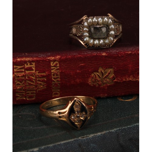 961 - An early 19th century mourning ring, the central rectangular aperture set with a lock of waxed hair ... 