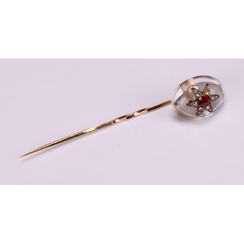 969 - Stick Pins - a 19th century diamond and ruby set polished oval rock crystal stick pin, set with a st... 