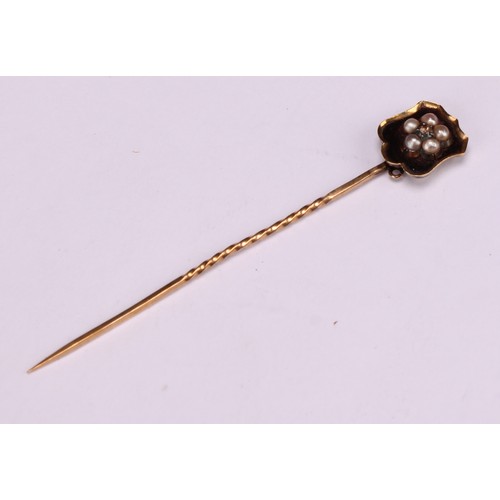 969 - Stick Pins - a 19th century diamond and ruby set polished oval rock crystal stick pin, set with a st... 