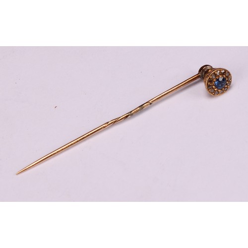 969 - Stick Pins - a 19th century diamond and ruby set polished oval rock crystal stick pin, set with a st... 