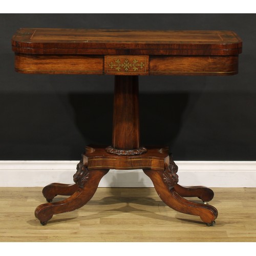 1427 - A Regency rosewood and brass marquetry card table, hinged top enclosing a baize lined playing surfac... 