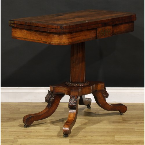 1427 - A Regency rosewood and brass marquetry card table, hinged top enclosing a baize lined playing surfac... 