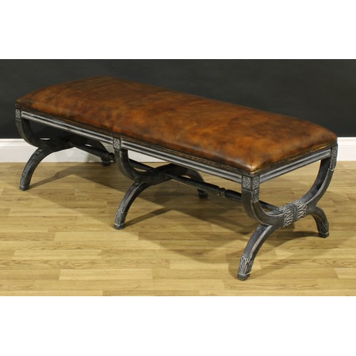 1430 - A Regency style ebonised sofa-length X-frame stool, stuffed-over leather upholstery, 48cm high, 133.... 