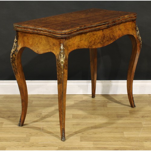 1436 - A Victorian Franglais gilt metal mounted walnut and marquetry serpentine card table, hinged top encl... 