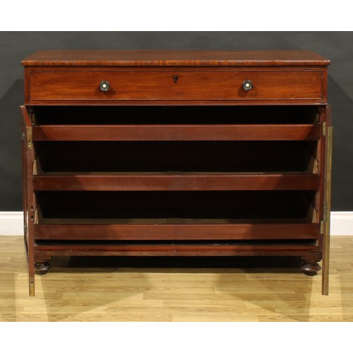 1411 - A George IV mahogany bachelor’s chamber dressing cabinet, slightly oversailing rectangular top above... 