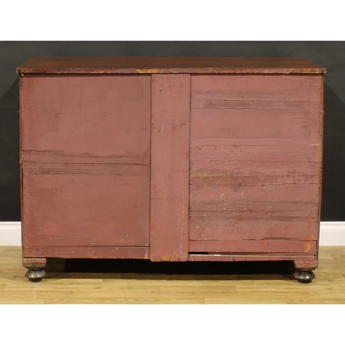 1411 - A George IV mahogany bachelor’s chamber dressing cabinet, slightly oversailing rectangular top above... 