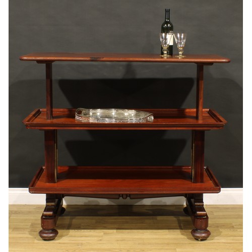 1873 - A William IV mahogany metamorphic buffet serving table, rounded rectangular top above two further pl... 