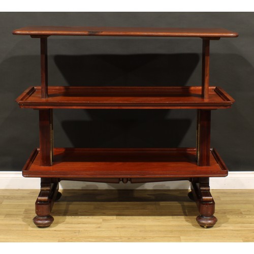 1873 - A William IV mahogany metamorphic buffet serving table, rounded rectangular top above two further pl... 