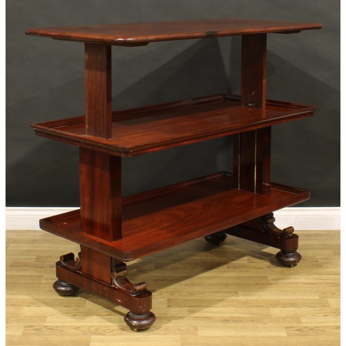 1873 - A William IV mahogany metamorphic buffet serving table, rounded rectangular top above two further pl... 