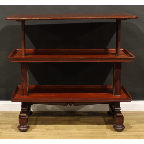 1873 - A William IV mahogany metamorphic buffet serving table, rounded rectangular top above two further pl... 