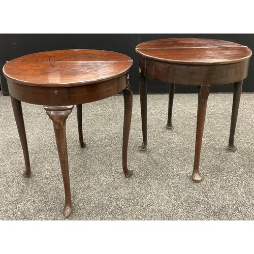 1535 - A near pair of 18th century mahogany demi-lune tea tables, possibly Irish, and of small proportions,... 