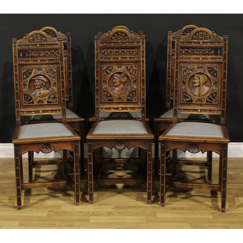 1348 - A set of six French Arts & Crafts period oak dining chairs, in the Henry II taste, each back carved ... 