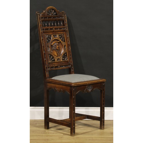 1348 - A set of six French Arts & Crafts period oak dining chairs, in the Henry II taste, each back carved ... 